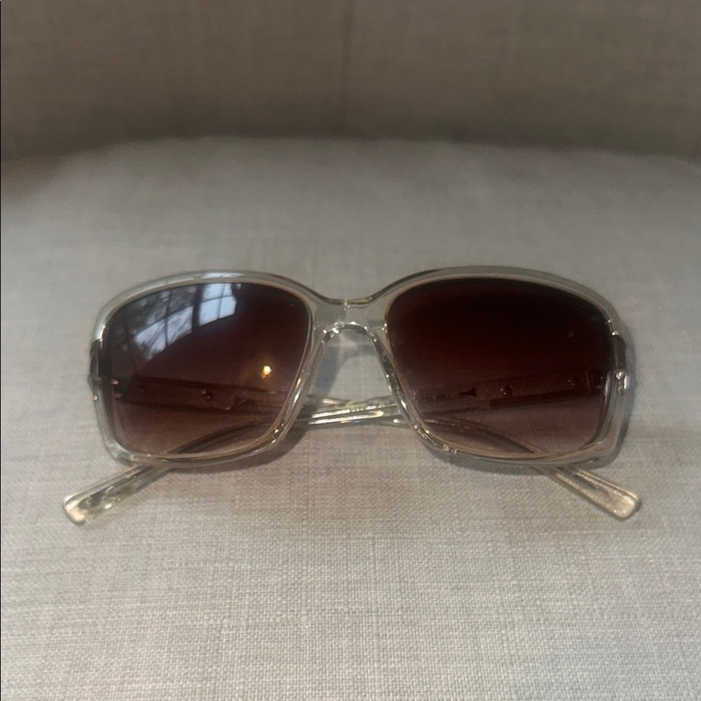 Ted Baker Gradient Sunglasses with tortoise detail on sides.